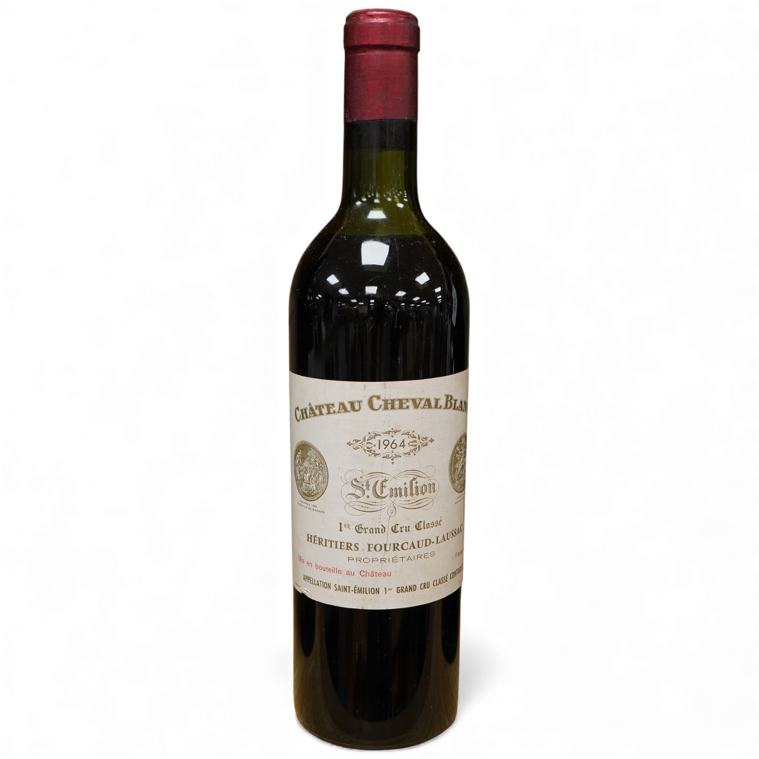 A bottle of Chateau Cheval Blanc Saint Emilion 1er Grand Cru Classé, 1964